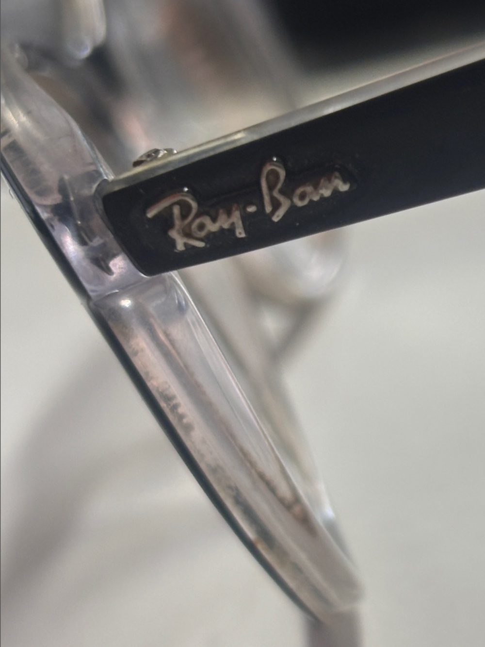 Ray-Ban Clear Frame glasses with Black Temples and Logo Detail